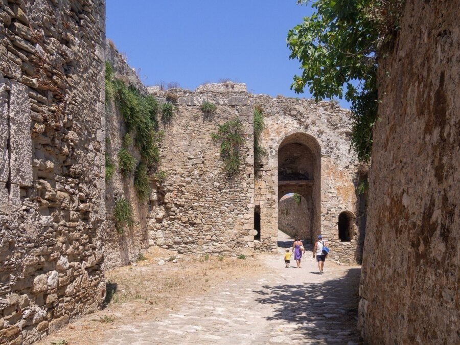 Stone archway and ramparts inside Methoni Castle