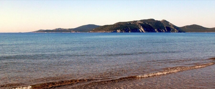 Sapientza island seen from the shore at dusk