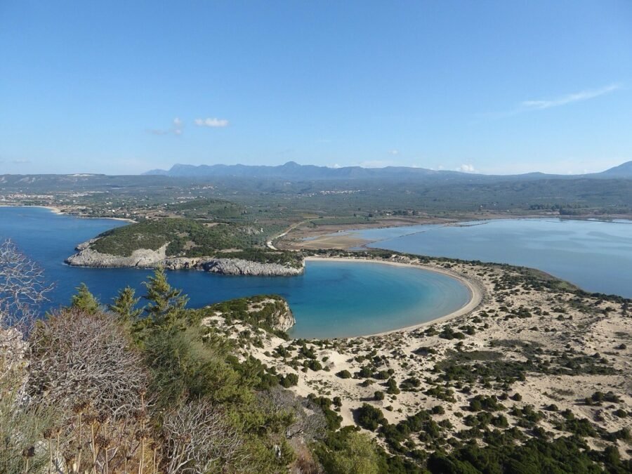 The perfect arc of Voidokilia beach further up the Messinian coast